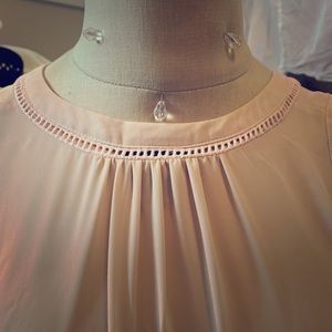 Cute light pick blouse.